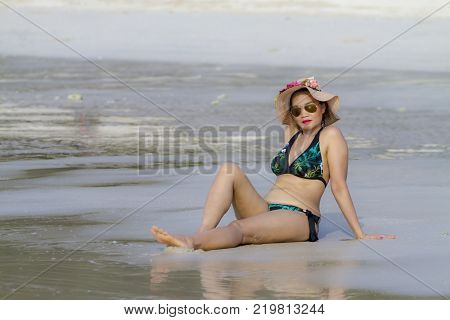 Woman with bikini shape beautiful on beach at Thung Wua Lan Beach Chumphon Province Thailand