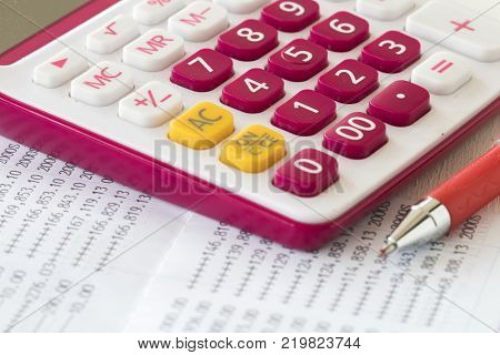 account passbook for management of business and check money with calculator