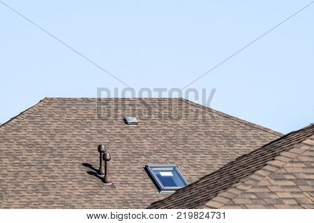 Decorative metal tile on a roof. Types of a roof of roofs.