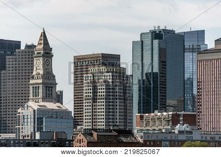 View of the historic Custom House skyscraper clock tower in skyline of Boston, Massachusetts USA
