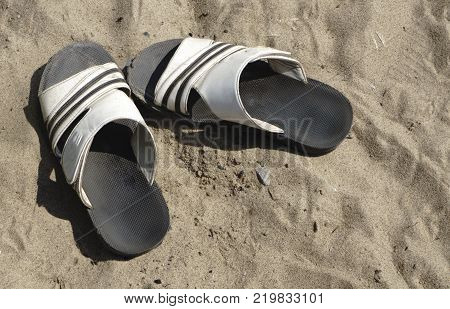 summer Slippers in the sand summer beaches
