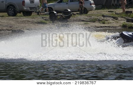 the spray from the motorcycle wall spray from the jet ski