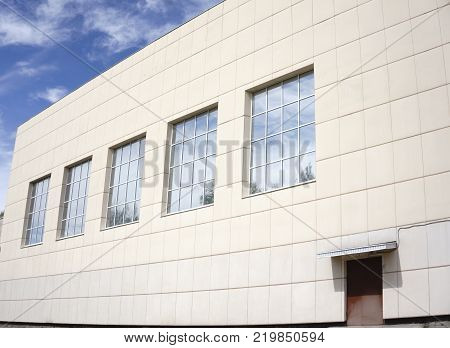 Building with facade cladding close up a lot and