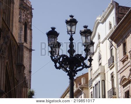 Tracery lights on the backdrop of ancient architecture
