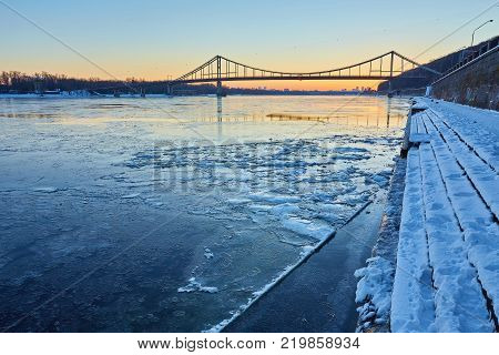 Evening view to Pedestrian bridge and Arc of a friendship of a nations in Kiev
