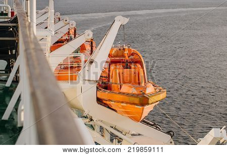 lifeboats on the ferry autumn cruise in the Baltic Sea.