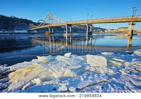 Evening view to Pedestrian bridge and Arc of a friendship of a nations in Kiev