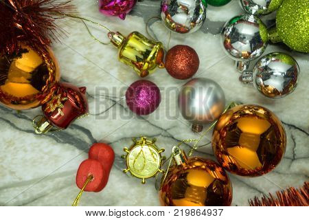Christmas festival in Bangkok. Golden Christmas tree with red ball and green yellow bokeh background .