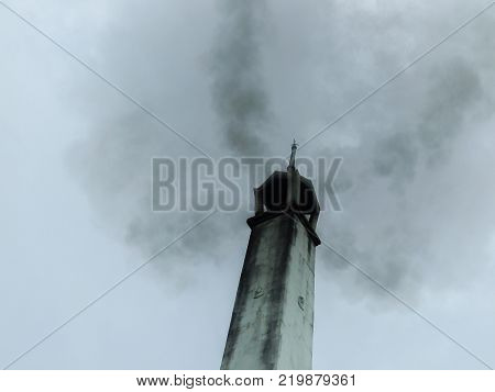 thai crematory with smoke on sad day