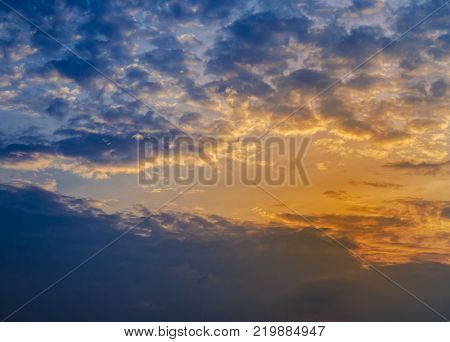 dramatic sky of sunset in the evening behind rain