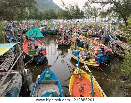 Many ships on the seawaves inthe twilight time in Thailand sea.