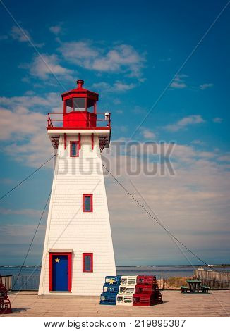 Colorful Arcadian lighthouse on the coast of new brunswick