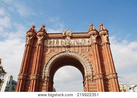 BARCELONA, SPAIN - NOVEMBER 1, 2017: Exterior of the historic Arc de Triomf. The landmark was built in 1888 as the entrance to the Barcelona World Exposition.