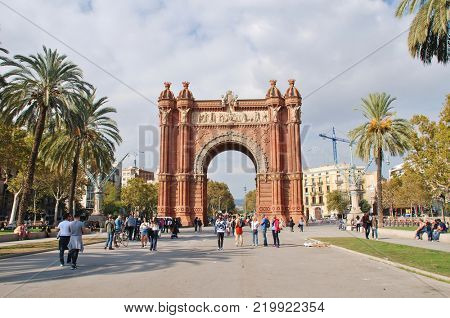BARCELONA, SPAIN - NOVEMBER 1, 2017: Exterior of the historic Arc de Triomf. The landmark was built in 1888 as the entrance to the Barcelona World Exposition.
