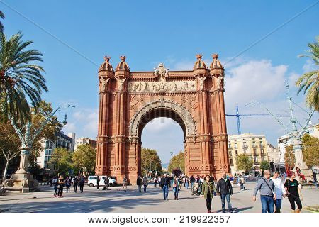 BARCELONA, SPAIN - NOVEMBER 1, 2017: Exterior of the historic Arc de Triomf. The landmark was built in 1888 as the entrance to the Barcelona World Exposition.