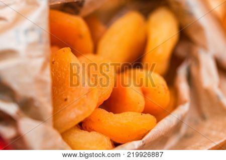 Close-up of tasty dried orange apricots. Selective focus