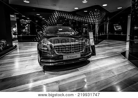 BERLIN - DECEMBER 21, 2017: Showroom. Full-size luxury car Mercedes-Benz S-Class S350d (W222 Facelift). Black and white. Since 2017.