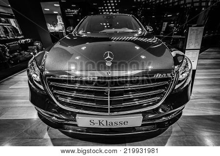 BERLIN - DECEMBER 21, 2017: Showroom. Full-size luxury car Mercedes-Benz S-Class S350d (W222 Facelift). Black and white. Since 2017.
