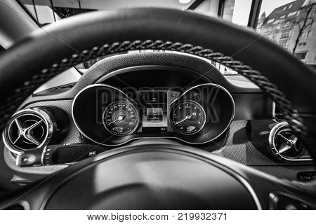 BERLIN - DECEMBER 21, 2017: Showroom. Interior of mid-size luxury pickup truck Mercedes-Benz X-Class X220d 4Matic. Black and white. Since 2017.