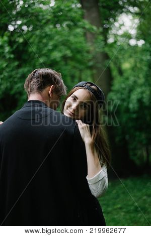 lovely cople  running and play in city park