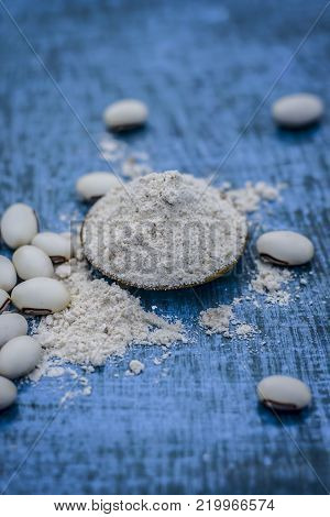Close Up Of Ayurvedic Herb Kuanch,cowhage,mucuna Pruriens With Powder.