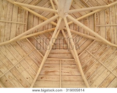 Close-up Of A Part Of A Wooden Beach Umbrella
