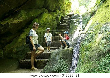 Mother With Two Sons In Dantovo Gorge, Krasnodar Region, Russia