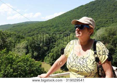 Senior Woman On Observation Deck