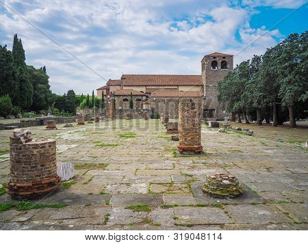Panoramic View Of San Giusto Cathedral And Roman Forum Ruins In Trieste, Northern Italy