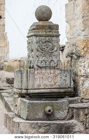 Stone Fountain In Which You Can Read The Date Of The Founding Of Mongui