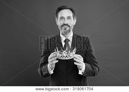 He Is A Big Boss Here. The Old Man Or Big Boss. Proud Boss. Big Boss Holding Jewelry Crown On Red Ba