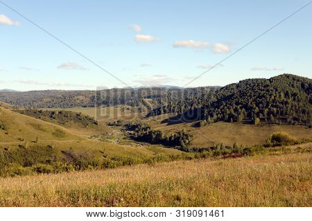 Landscape In The Vicinity Of The Taiga Village Generalka In The Mountains Of The Altai Territory. We