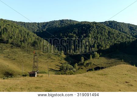 Tv Tower Near The Taiga Village Of Generalka In The Mountains Of Altai Krai