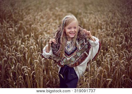 Girl Indian Shaman Blonde In A Poncho
