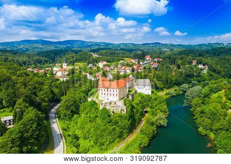 Aerial Drone View Of The River Kupa And Ozalj Castle In The Town Of Ozalj, Croatia