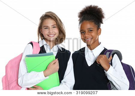 Happy Girls In School Uniform On White Background
