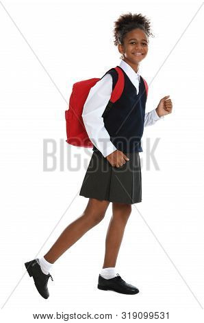 Happy African-american Girl In School Uniform On White Background