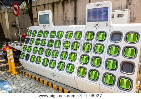 Taipei, Taiwan - August 17th, 2019: charging station for battery packs of Taiwan-based Gogoro electronic motocycle at street in Taipei, Taiwan, Asia