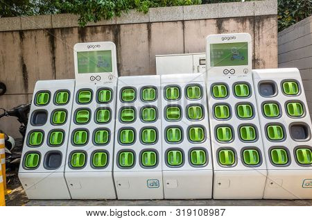 Taipei, Taiwan - August 17th, 2019: charging station for battery packs of Taiwan-based Gogoro electronic motocycle at street in Taipei, Taiwan, Asia