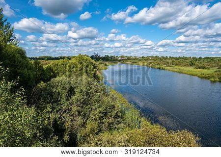 Summer Rural Landscape With The Lukh River In The Village Of Myt, Russia.
