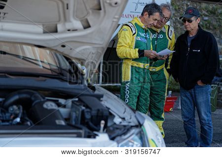 Chamrousse, France, August 25, 2019 : Drivers Look At The Times Sheet During Uphill Race, Counting F