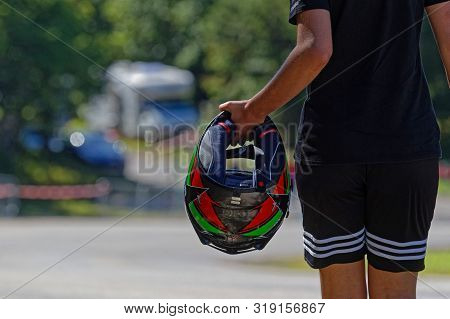 Chamrousse, France, August 25, 2019 : Wearing Helmet For Her Pilot During Uphill Race Of Chamrousse,