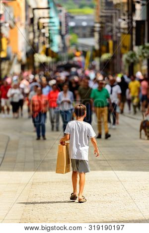 Andorra La Vella, Andorra : 2019 August 22 :  Andorra La Vella. People Walk In The Comercial Street 