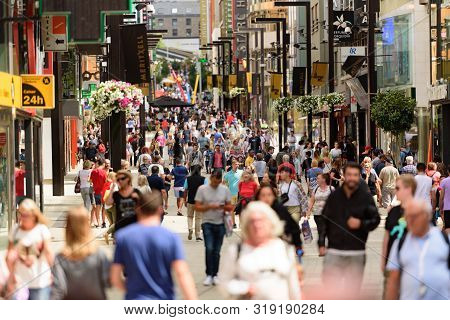 Andorra La Vella, Andorra : 2019 August 22 :  Andorra La Vella. People Walk In The Comercial Street 