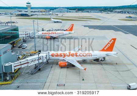 GATWICK AIRPORT, LONDON, ENGLAND â AUGUST 22 2013, Easy Jet and British Airways airplanes at London Gatwick Airport, England