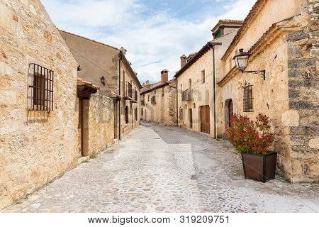 Typical Street In The Historical Town Of Pedraza. Segovia. Spain.