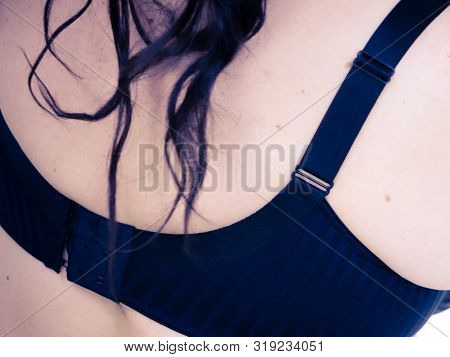 Fat Woman Rear View Opening Taking Off Or Putting On Her Bra. Plus Size Overweight Female Model Wear