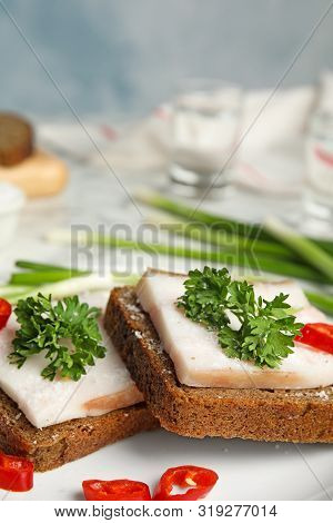 Plate With Pork Fatback Sandwiches Served On Table, Closeup. Space For Text