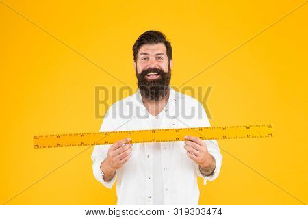 There Is No Substitute For A Great Teacher. Happy Teacher Holding Ruler On Yellow Background. Maths 
