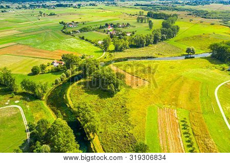 Croatia, Countryside Landscape, Small Village By Gacka River In Region Of Lika, Aerial View